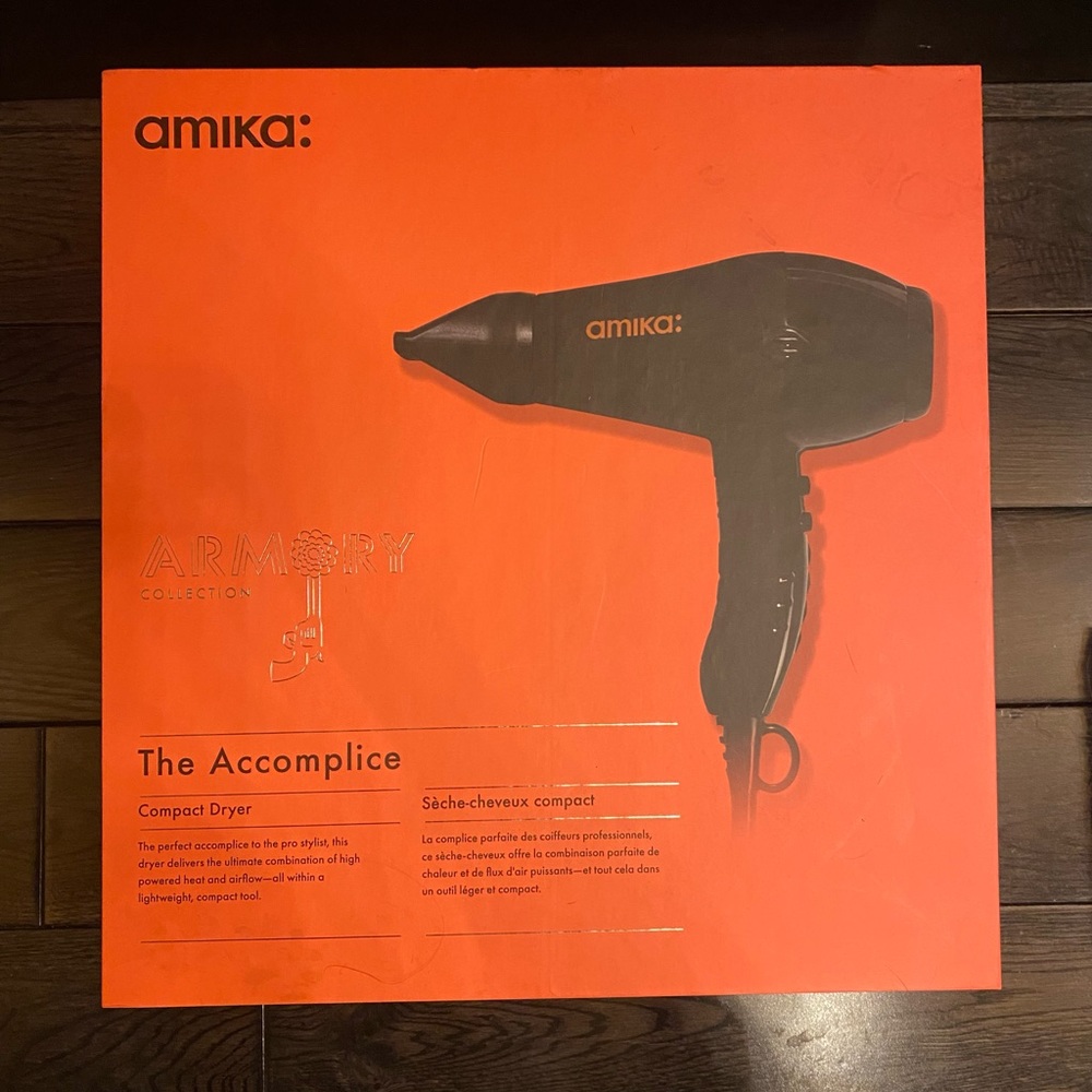 BRAND NEW Amika Accomplice Ionic hair dryer.